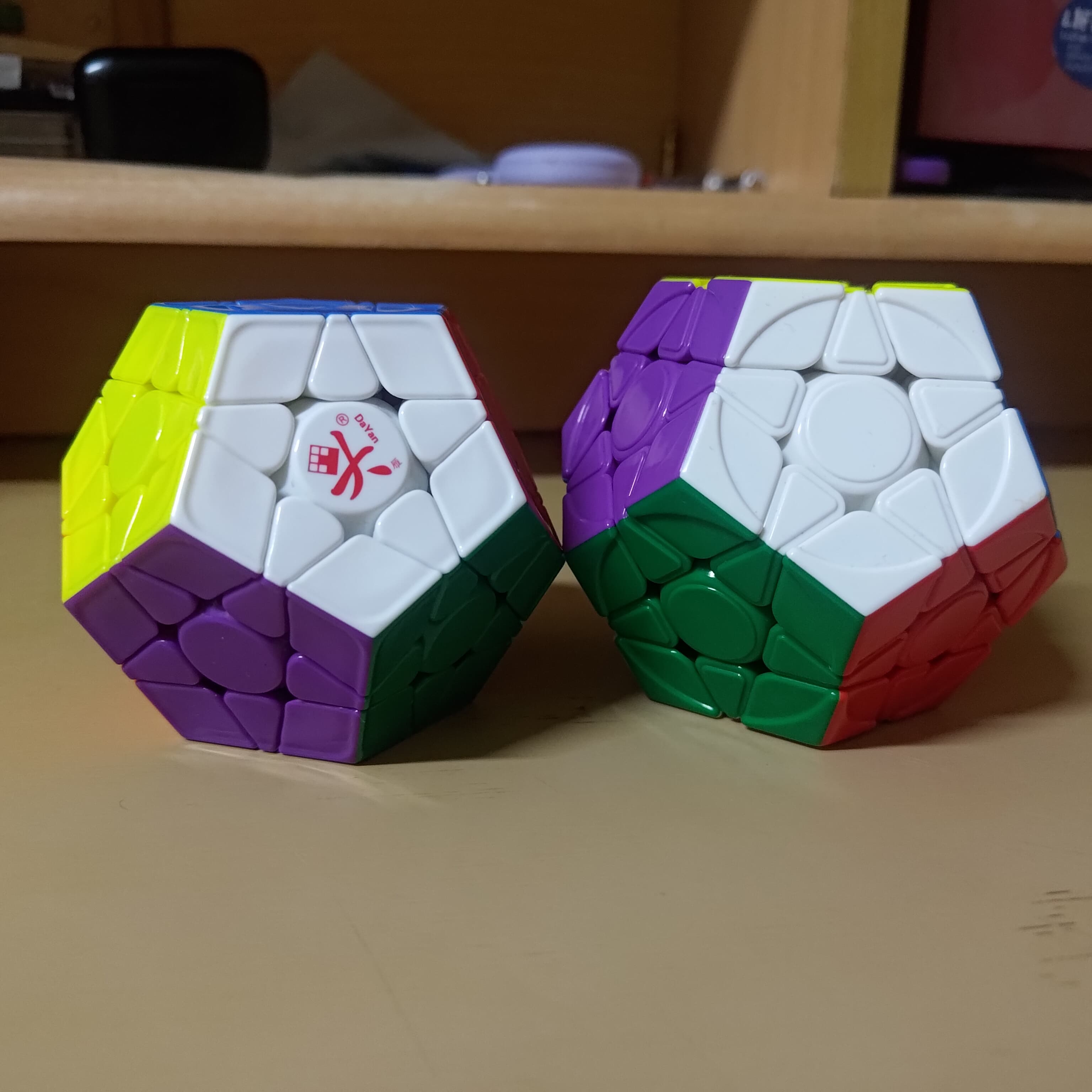 Left: Dayan Megaminx Pro, Right: YuHu v2 M