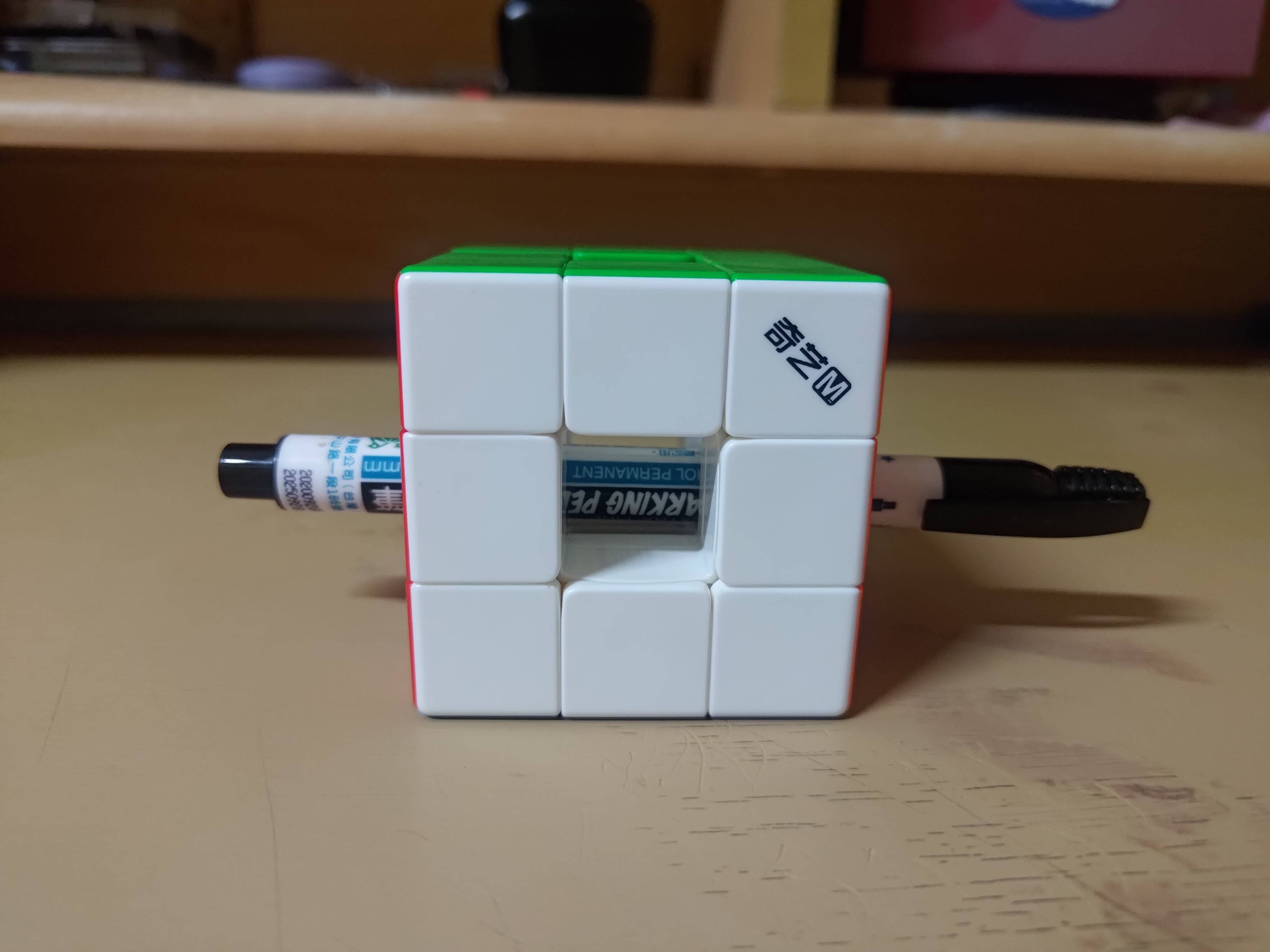 Qiyi void cube with a marker pen through it